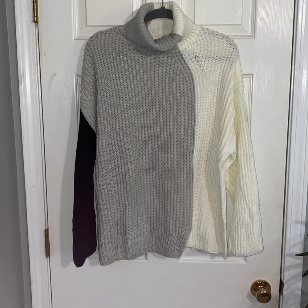 Black, white, and gray sweater